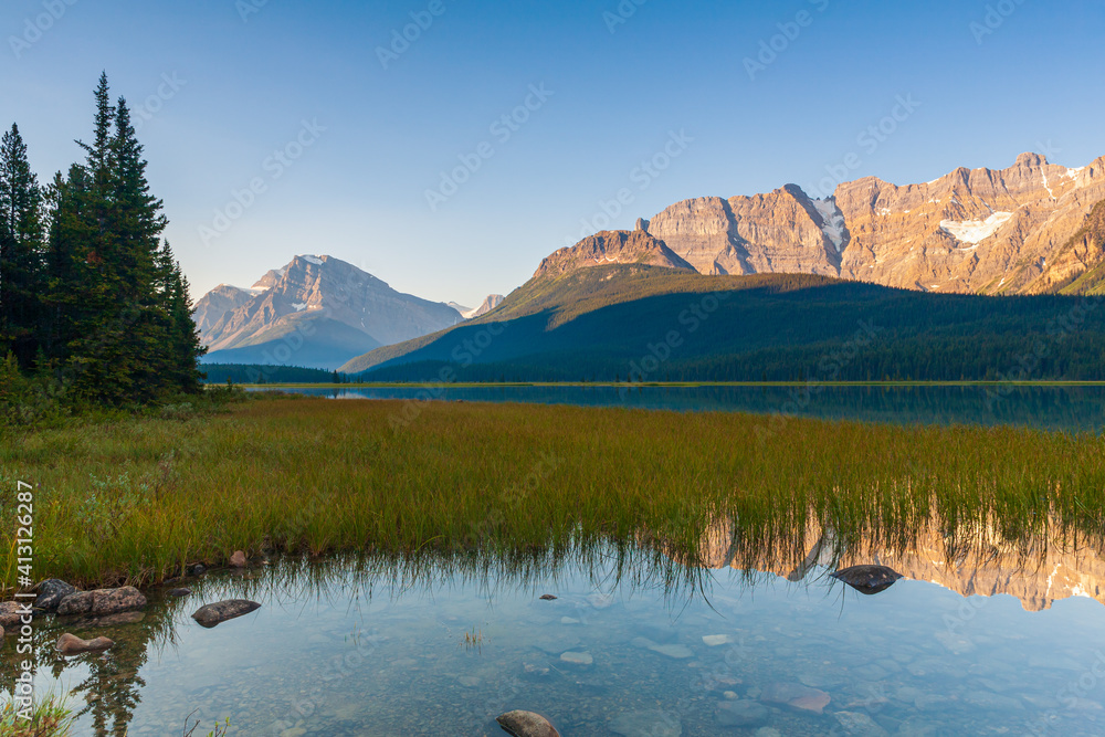 Howse Peak relected in Waterfowl Lake in Banff National Park, Alberta, Canada at sunrise