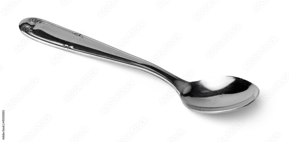 Silver spoon isolated on white background close up Silver spoon isolated on white background close up