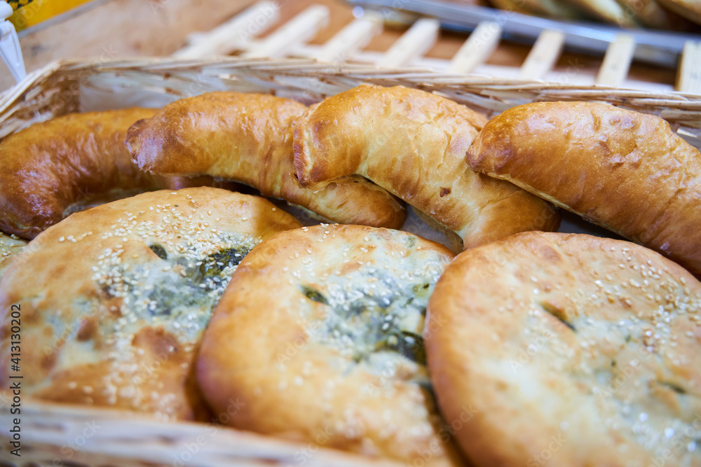 Puff pastry triangles filled with feta cheese and spinach