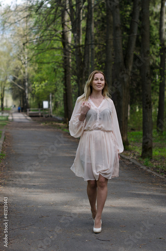 young girl in a dress in the park © vladimirvu