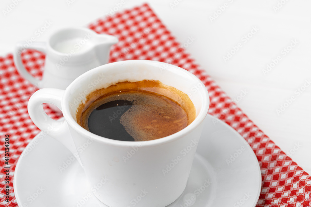 Fototapeta premium Cup of espresso coffee on saucer close up