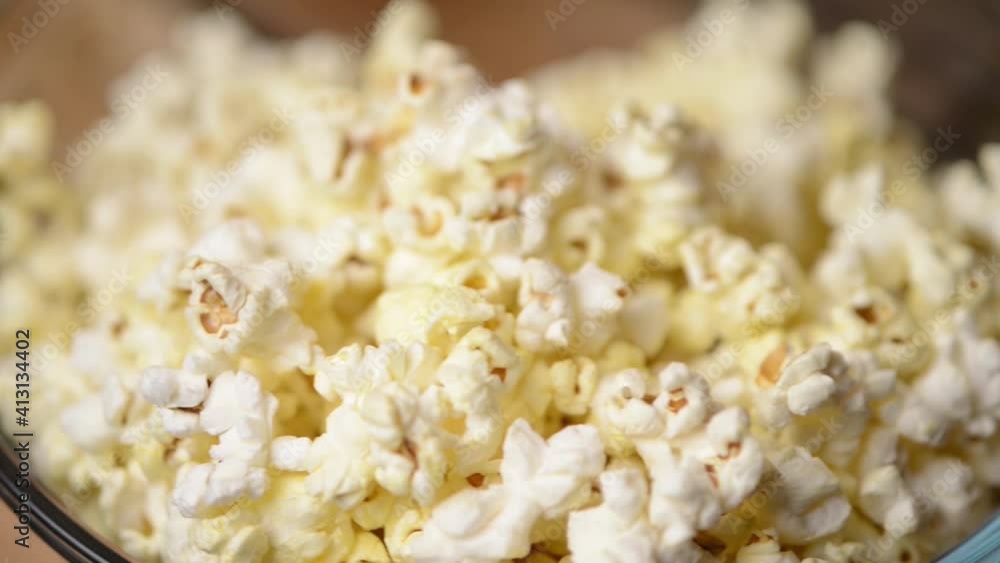 Pop corn being poured on bowl parallax Pop corn being poured on bowl parallax
