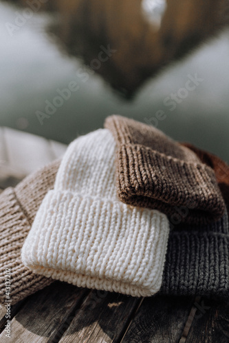 knitted cap on wooden background