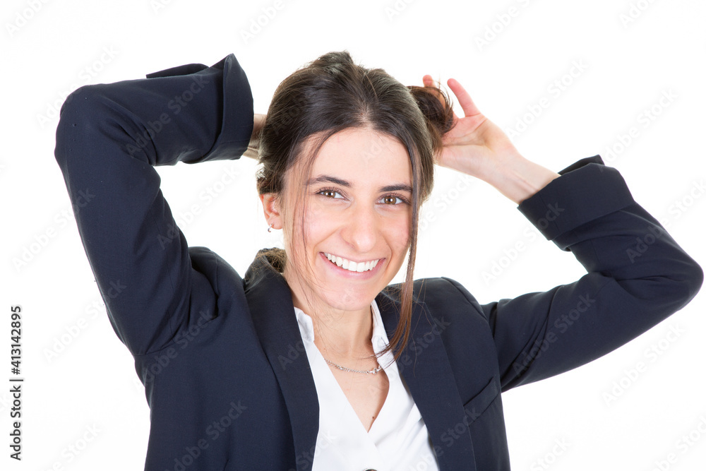 Confident businesswoman smiling at the camera hands on hair isolated on white background Confident businesswoman smiling at the camera hands on hair isolated on white background