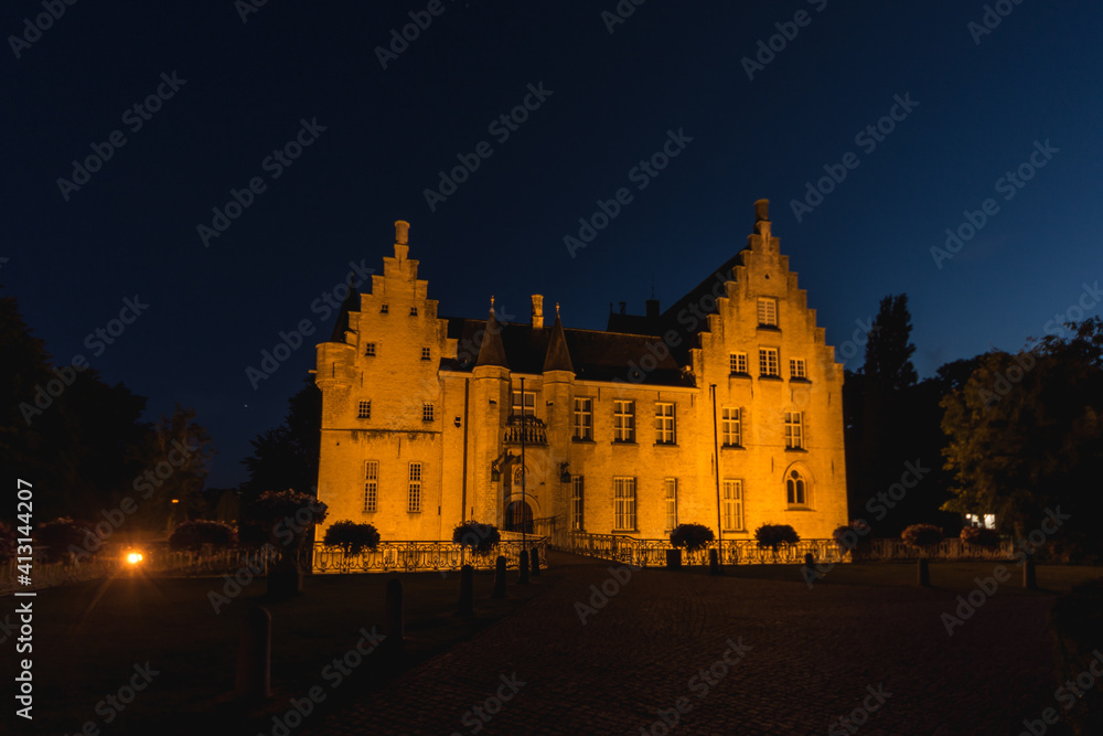 Cortewalle Castle, in Beveren, Belgium, at night