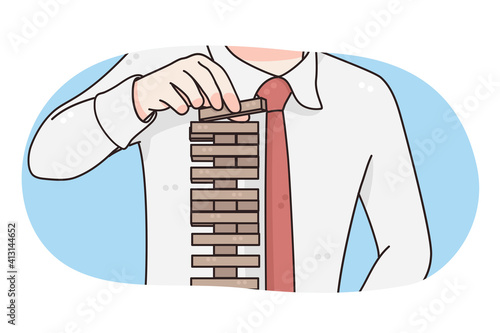 Business strategy, risks, planning concept. Hands of businessman placing wooden block in tower trying to be careful with all tasks and achieve targets in business vector illustration 