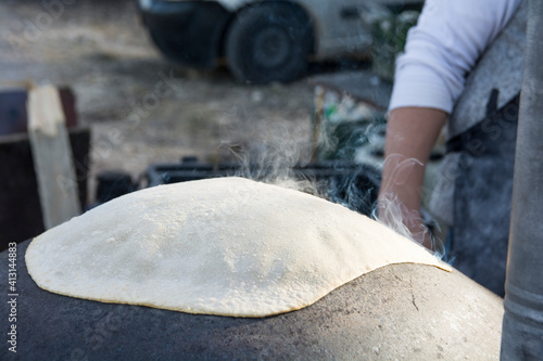 Traditional Druze Pita bread, baked on a Saj or Tava, on open fire