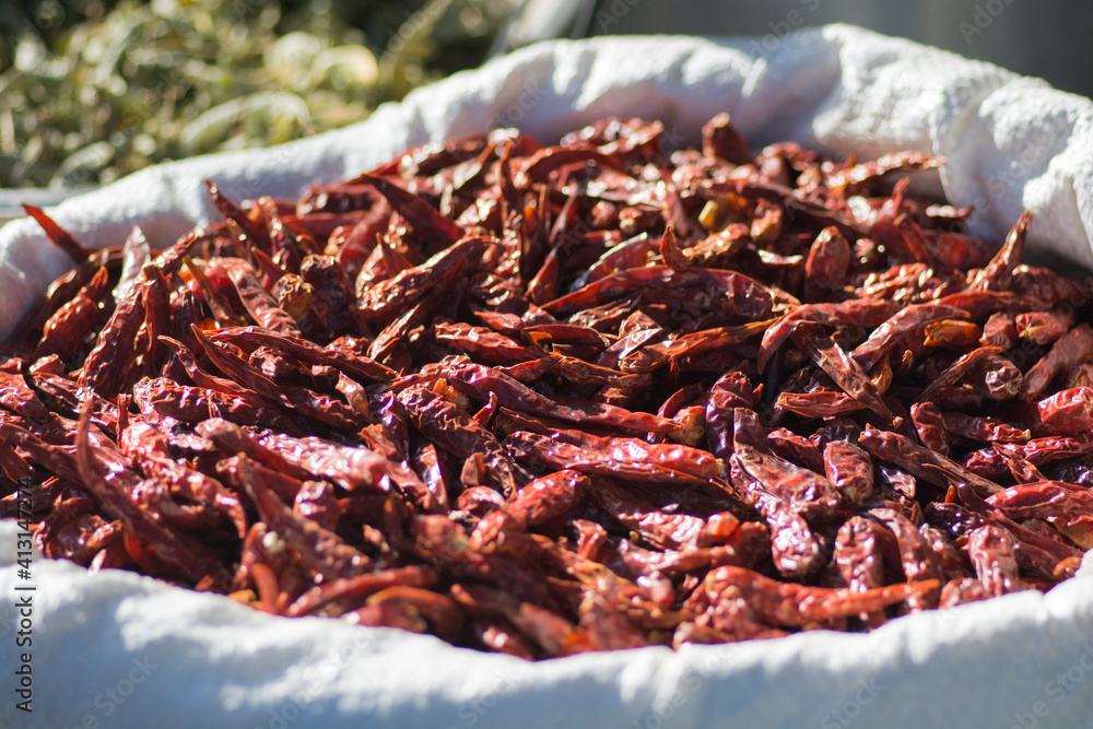 Fototapeta premium Dried Red Chili peppers, presented for sale in the market