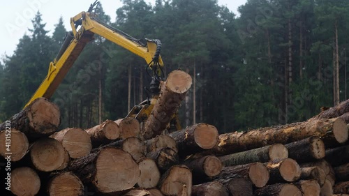 The manipulator transports logs in the logging industry.