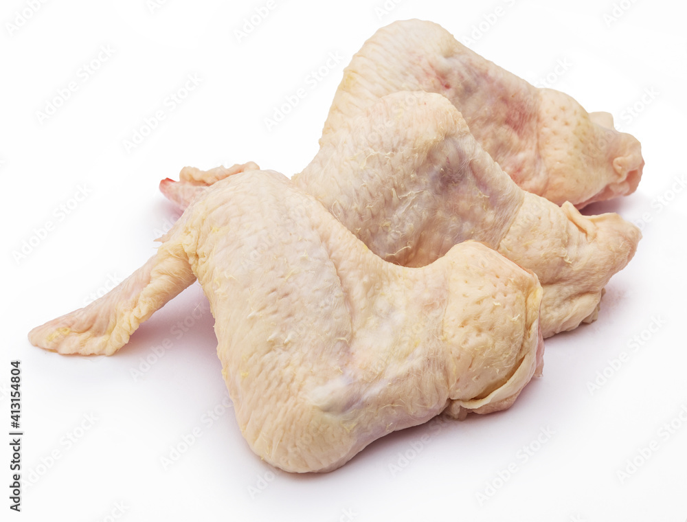 Three clean raw chicken wings, isolated on white background. Three clean raw chicken wings, isolated on white background.