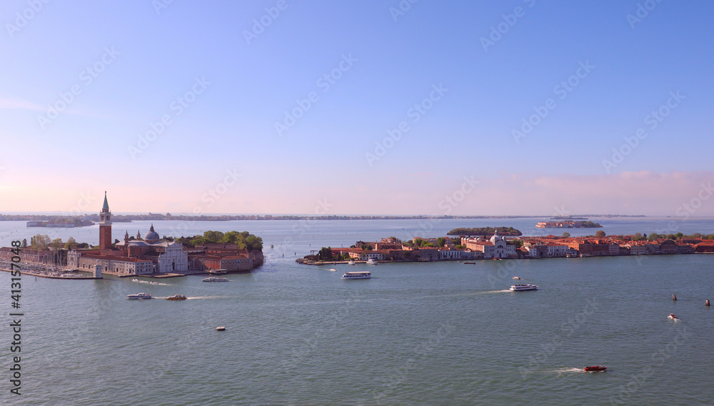 Bird's eye view of the island with the Church of San Giorgio Maggiore, the Grand Canal and the Venetian lagoon from the Campanile tower of the Basilica of San Marco. Panoramic image
