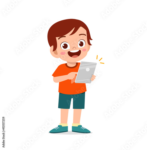 cute little boy using smartphone and internet