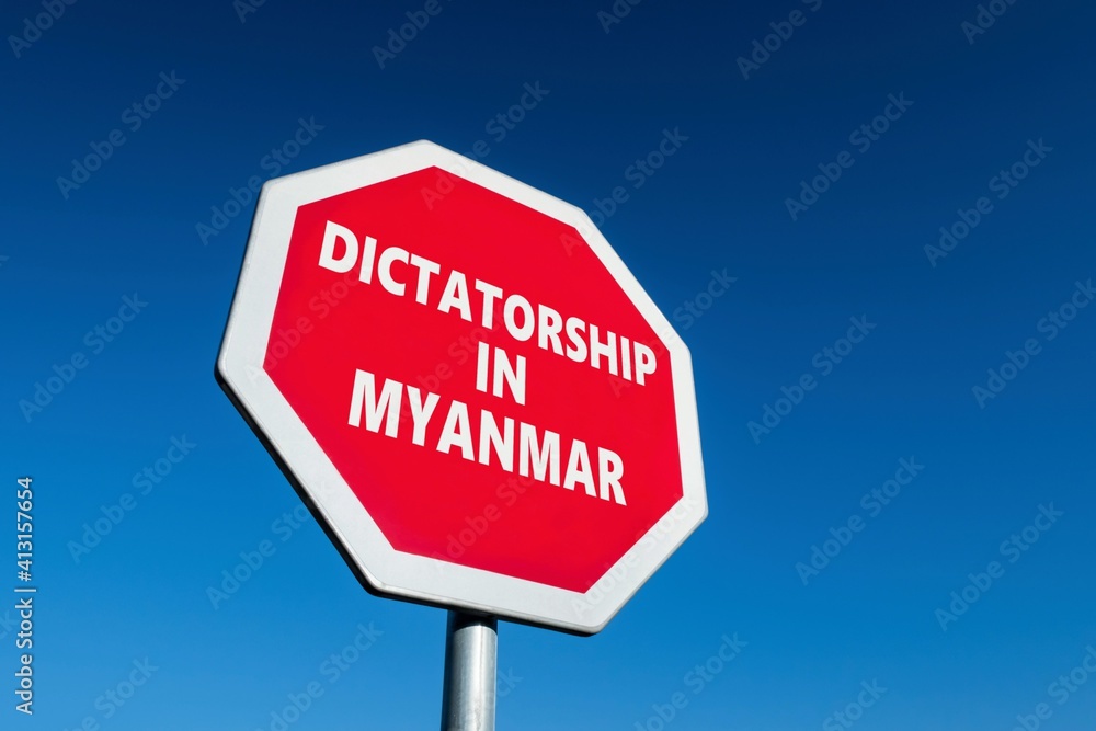 Stop sign with DICTATORSHIP IN MYANMAR text to change the results of military coup in the country Stop sign with DICTATORSHIP IN MYANMAR text to change the results of military coup in the country