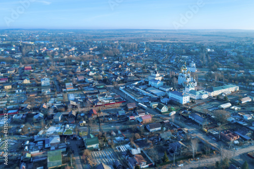 Tilt-shift aerial view of the town and St. Nicolas monastery  Nikolsky monastery  at sunny winter day. Pereslavl-Zalessky  Yaroslavl Oblast  Russia.