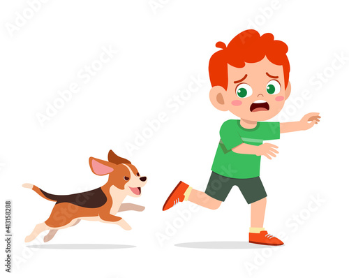 cute little boy scared because chased by bad dog