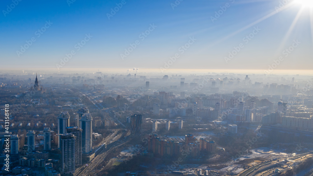 Contre-jour aerial view of Moscow at sunny winter day. Russia.