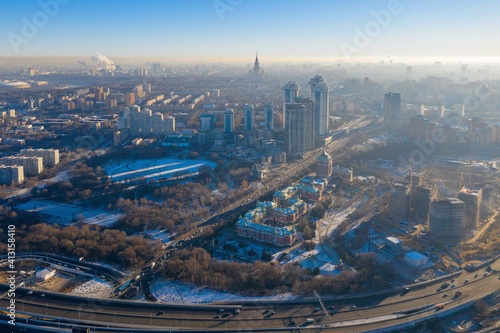 Contre-jour aerial view of Moscow (Ramenki district) at sunny winter day. Russia.