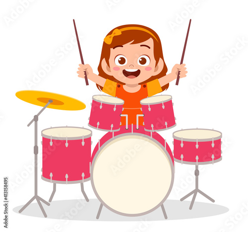 cute little girl play drum in concert
