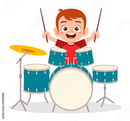 cute little boy play drum in concert