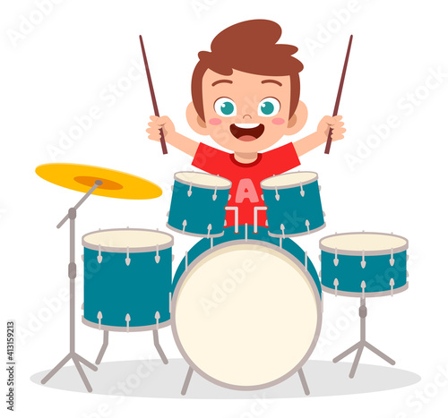 cute little boy play drum in concert