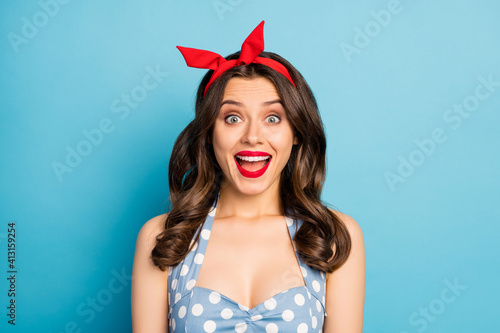Close up photo of astonished crazy cheerful girl listen incredible black friday novelty impressed scream unbelievable unexpected wear retro style singlet isolated over blue color background