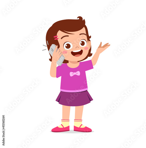 cute little girl talk using mobile phone