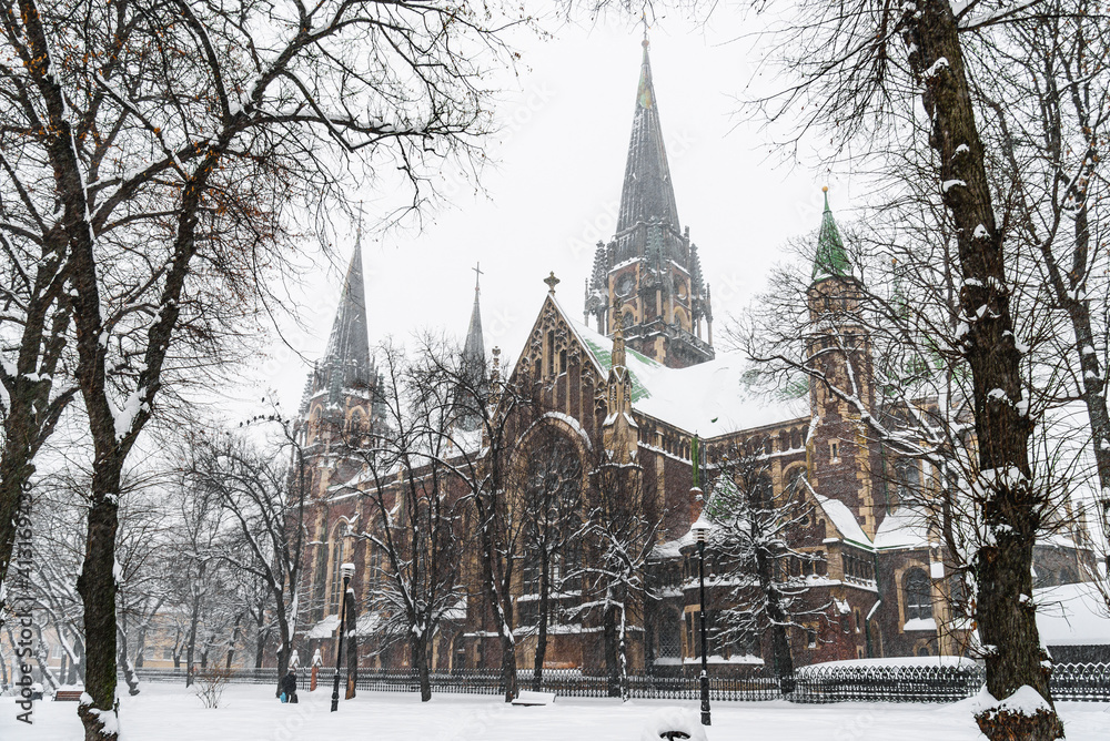 LVIV, UKRAINE - FEBRUARY 10, 2021: The Church of Sts. Olha and Elizabeth, Heavy blizzard in the city.