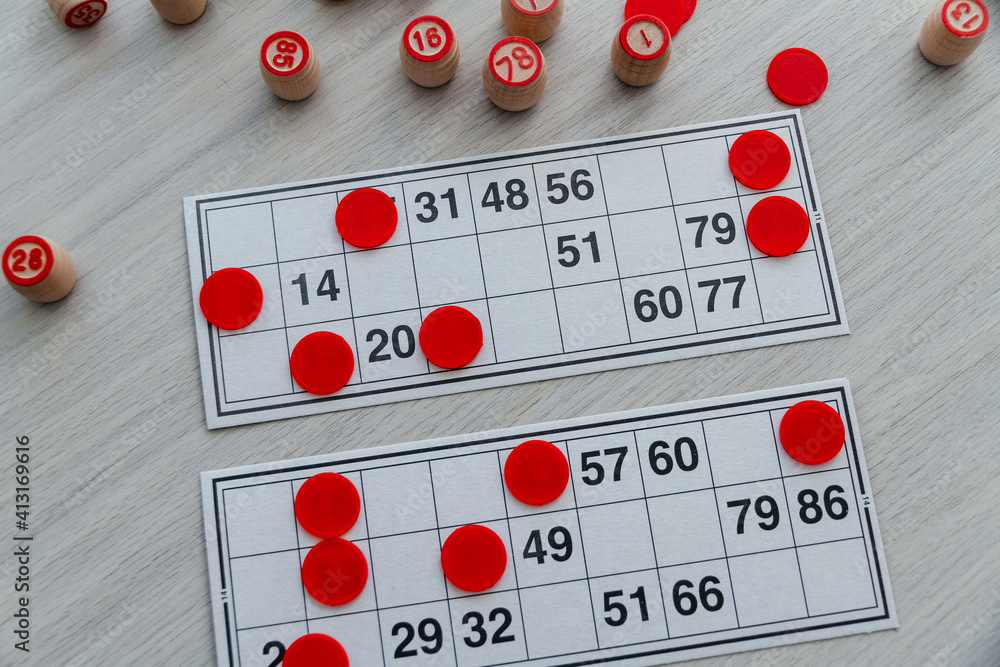 Traditional Russian board game Russian Lotto. Cards with numbers, closeup. Traditional Russian board game Russian Lotto. Cards with numbers, closeup.