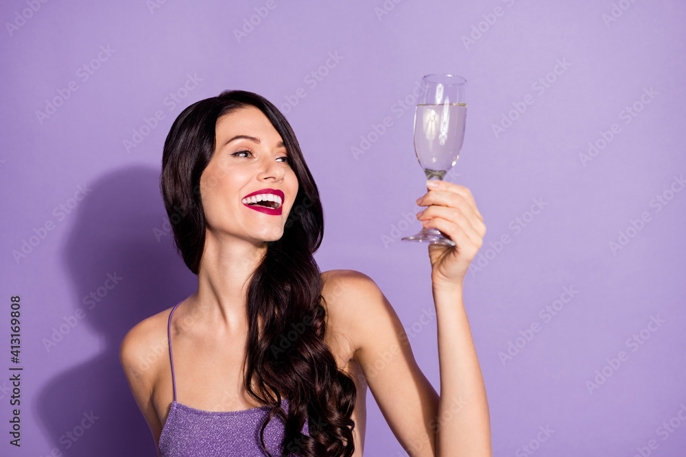 Photo of young cheerful girl happy positive smile enjoy party drink champagne isolated over purple color background Photo of young cheerful girl happy positive smile enjoy party drink champagne isolated over purple color background