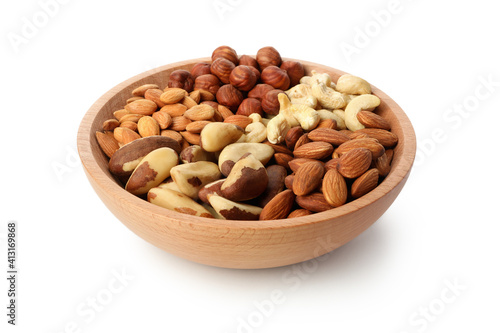 Bowl with different nuts isolated on white background