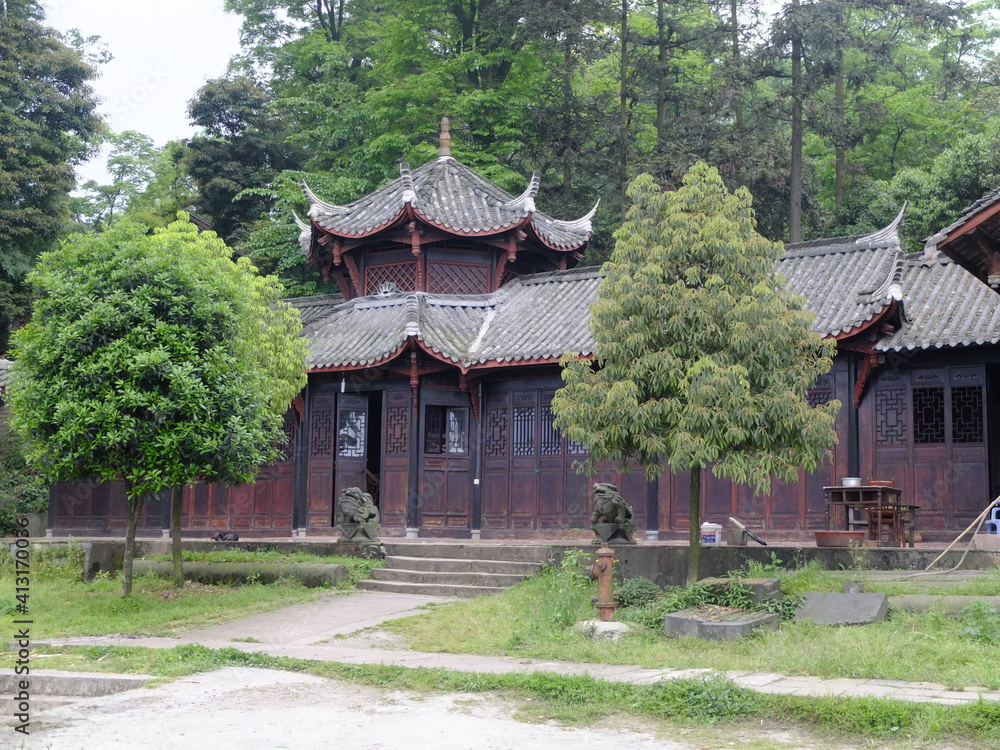 An ancient, traditional Chinese style building on the side of Mount Qingcheng, Sichuan, China An ancient, traditional Chinese style building on the side of Mount Qingcheng, Sichuan, China