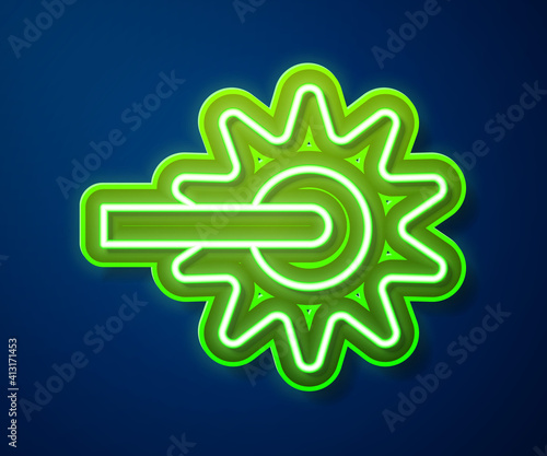 Glowing neon line Cowboy horse riding spur for boot icon isolated on blue background. Vector.