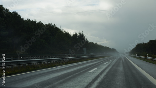 driving on wet asphalt, highway after thunderstorm