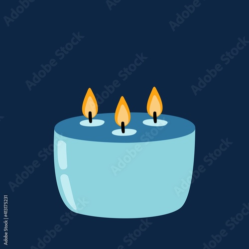 Big candle on dark background. Aromatic candle for spa, aromatherapy. Christmas, birthday, party, holiday