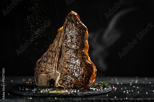 Aged Barbecue Porterhouse Steak. Beef T-Bone juicy steak rare beef with spices. American cuisine. The concept cooking meat. Medium rare Grilled T-Bone Steak, Barbecue aged wagyu porterhouse