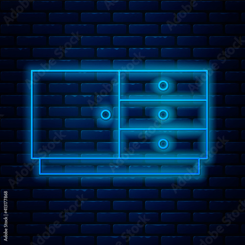 Glowing neon line Chest of drawers icon isolated on brick wall background. Vector.