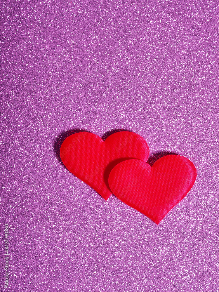 Valentine's Day concept, silver and red heart on pink background, greeting card
