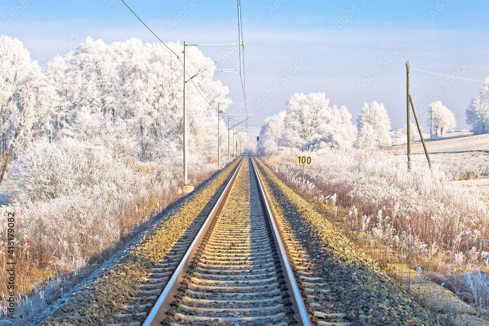 Fototapeta premium Railroad track in frost landscape view