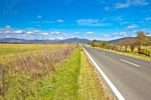 Krbava field. Scenic road through rural landscape of Lika region