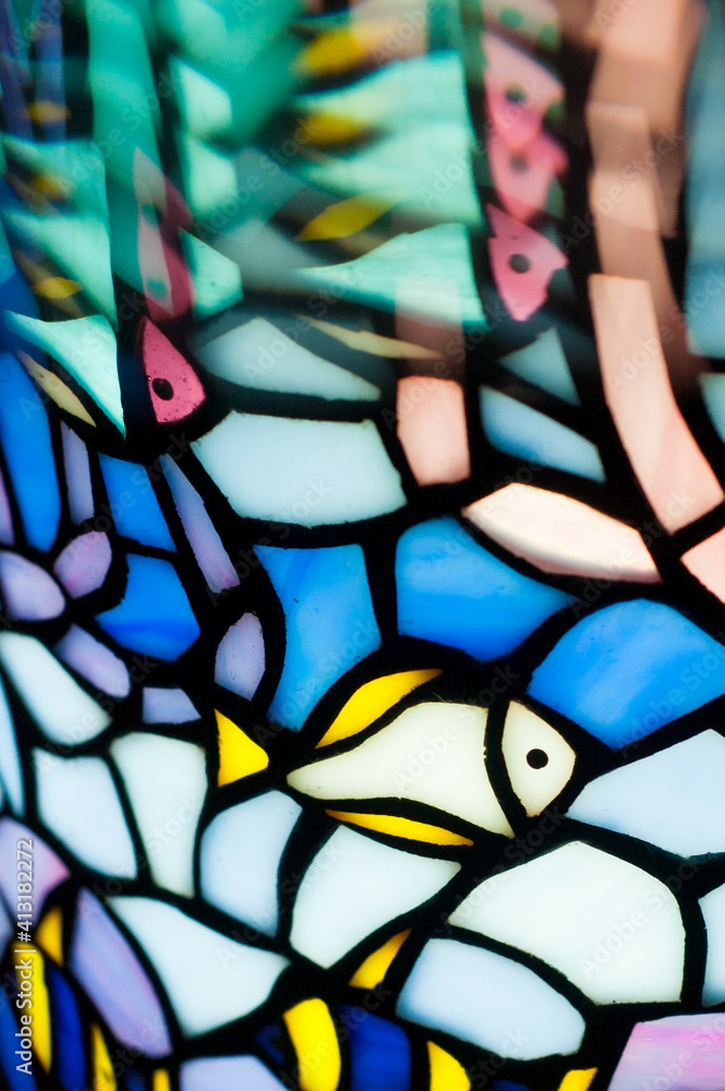 Stained glass series. artistic abstraction composed of organic patterns on the theme of seabed with goldfish