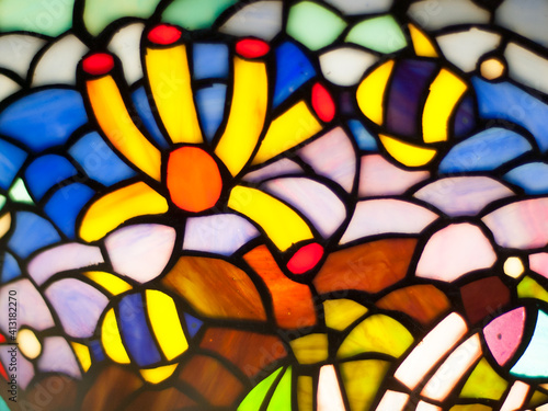Stained glass series. artistic abstraction composed of organic patterns on the theme of seabed with goldfish