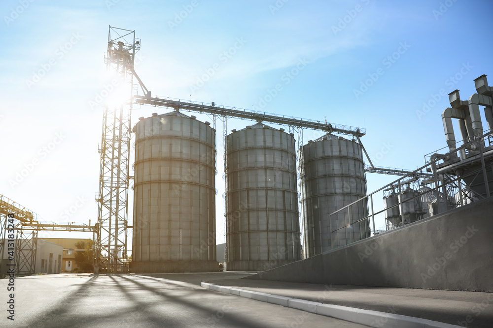 View of modern granaries for storing cereal grains outdoors View of modern granaries for storing cereal grains outdoors
