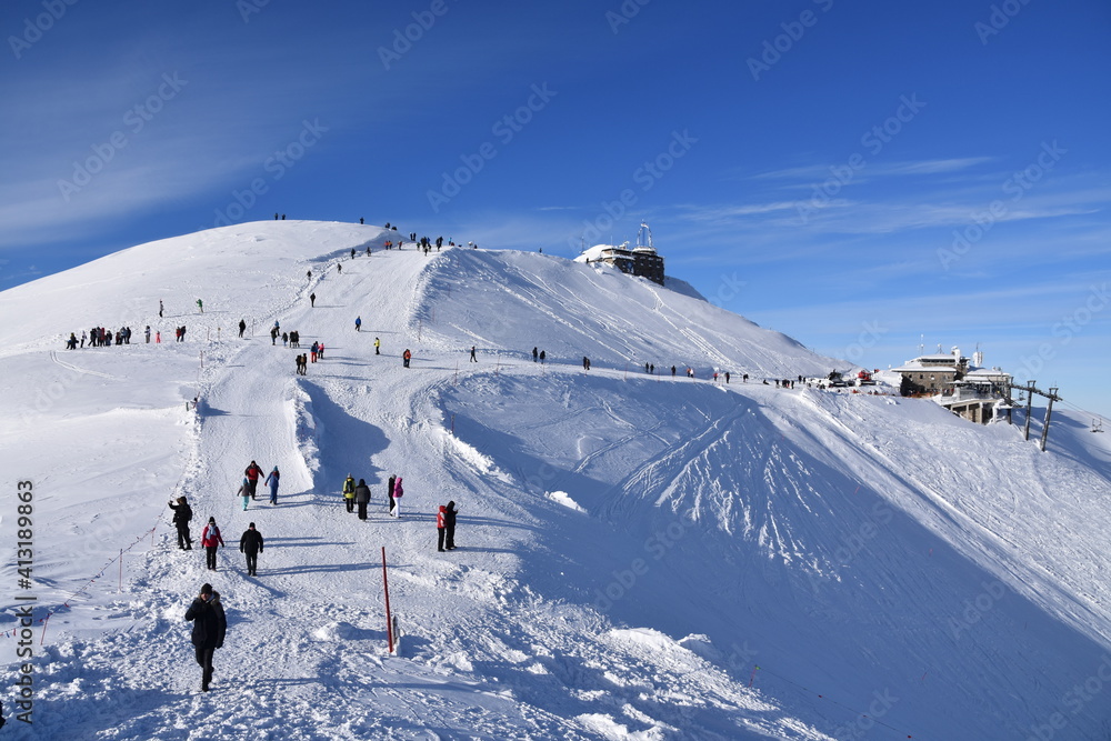 Kasprowy Wierch mountain, winter in the Tatras, tourists and skiers