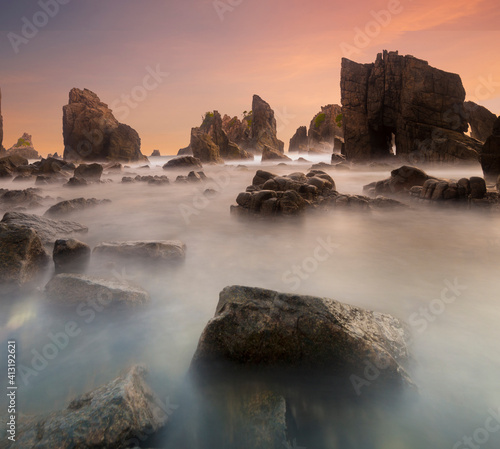 Shark teeth rock formation. this place called kelumbayan or gigi hiu in Indonesian language. This place offers you a very unique rock formation like teeth of the shark photo