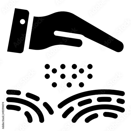 
Hand with seeds denoting glyph icon of seeds sowing 

