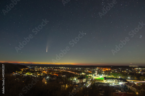 A comet in the sky over a night city in Ukraine © onyx124