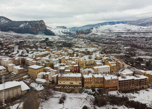 Village with snow with a castle in Nalda , La Rioja, Spain photo