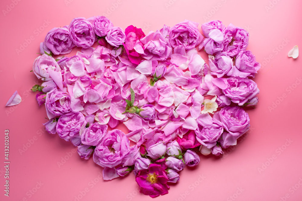 Obraz premium heart shape against pink background. romantic and beauty concept . top view