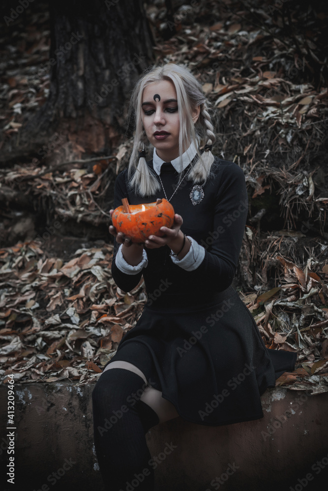 Naklejka premium Witch in the form of a student in the forest