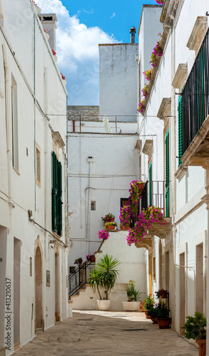 Characteristic alley in the historic center of Cisternino (Italty) photo